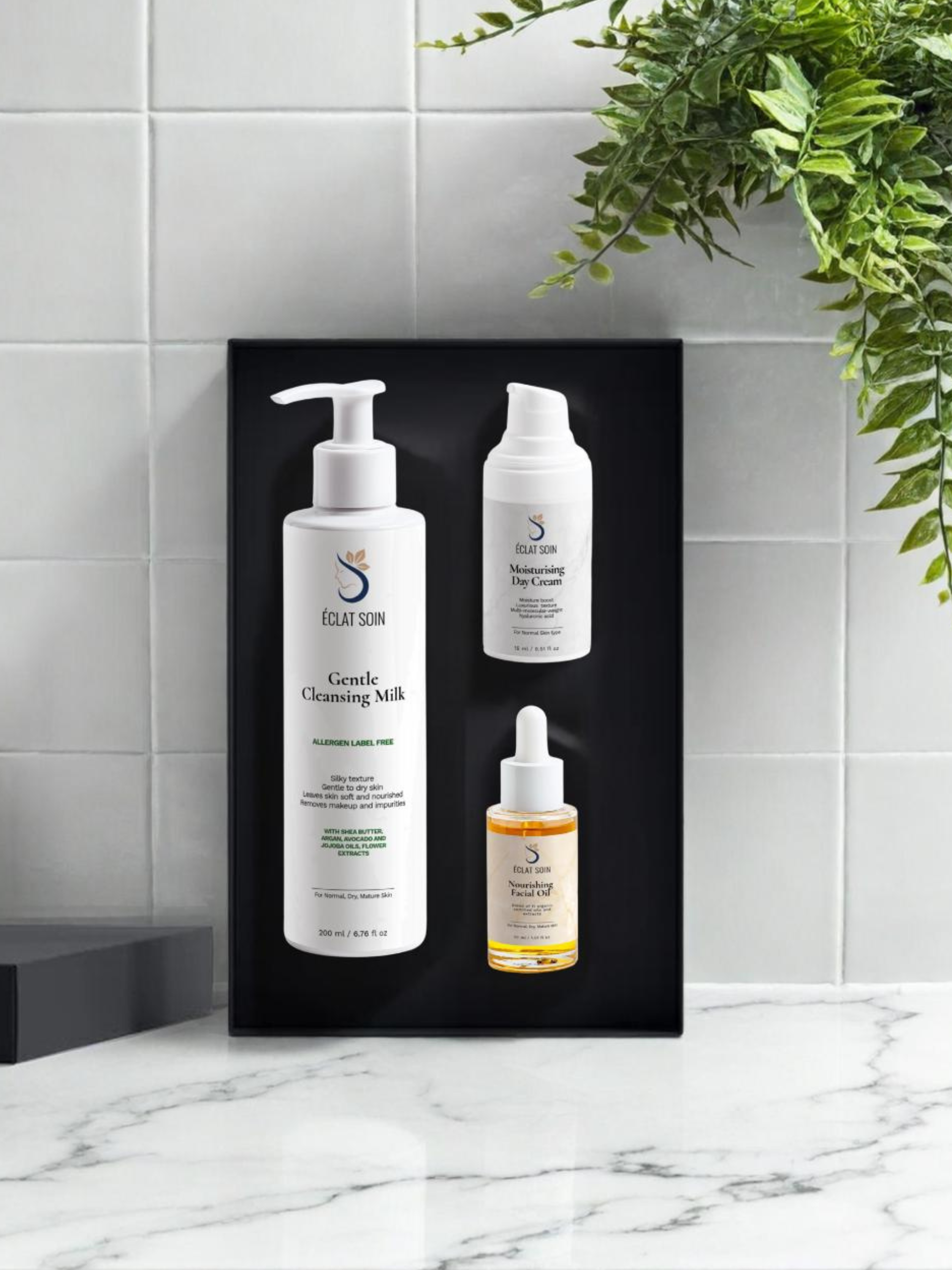 Eclat Soin Glowy Skin Trio Collection Box featuring cleansing milk, serum, and moisturizer.